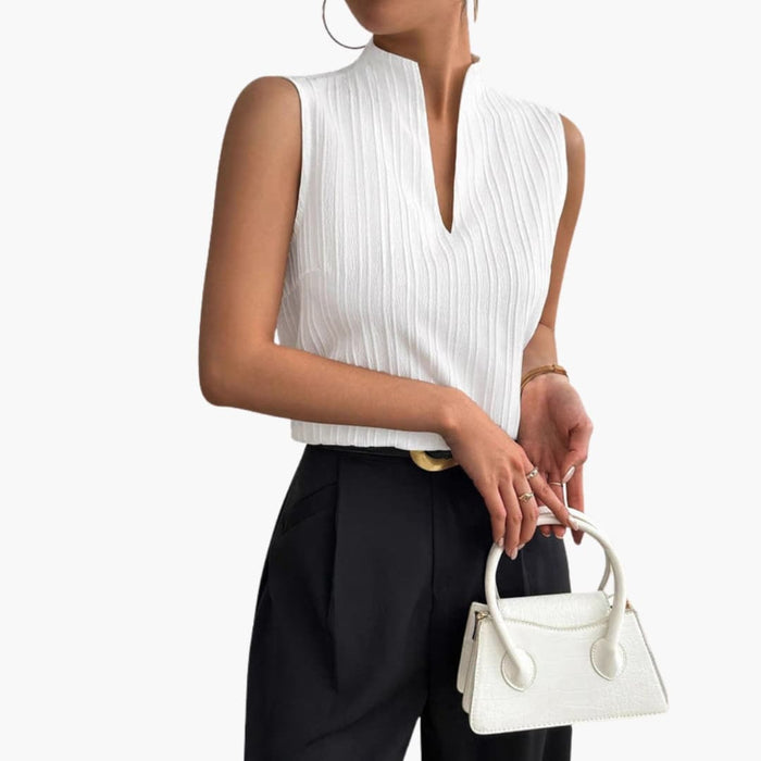 Women’s Sleeveless Top with Stand-Up Collar and Fine Pleats